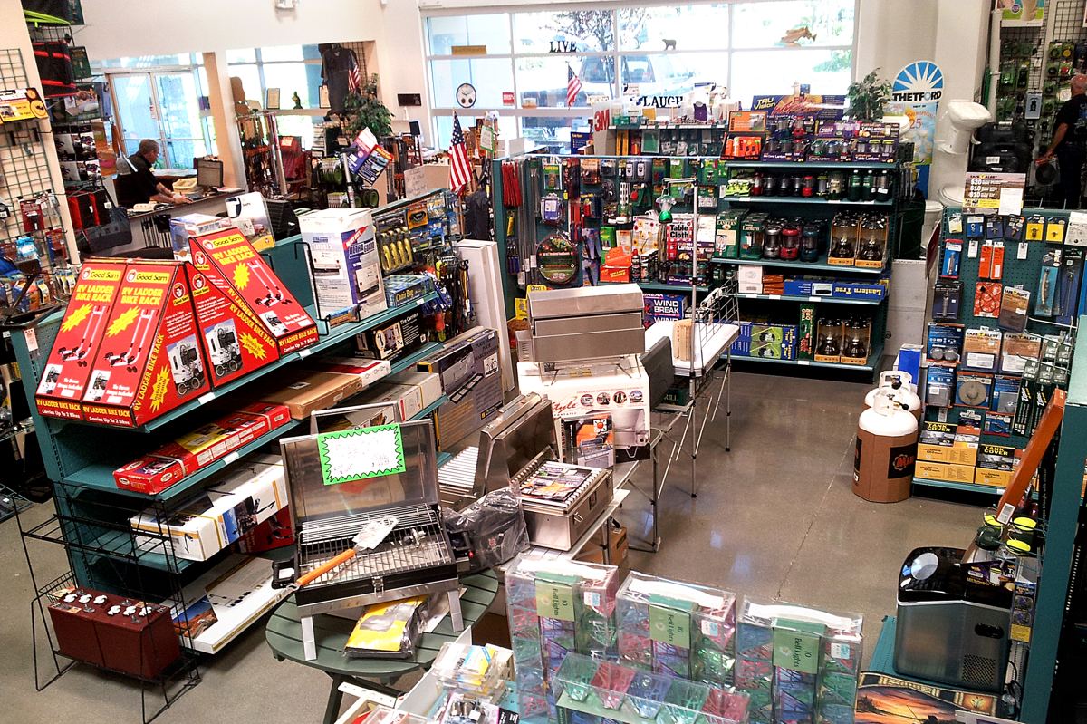 Inland Valley RV supply store aisle stocked with parts and accessories